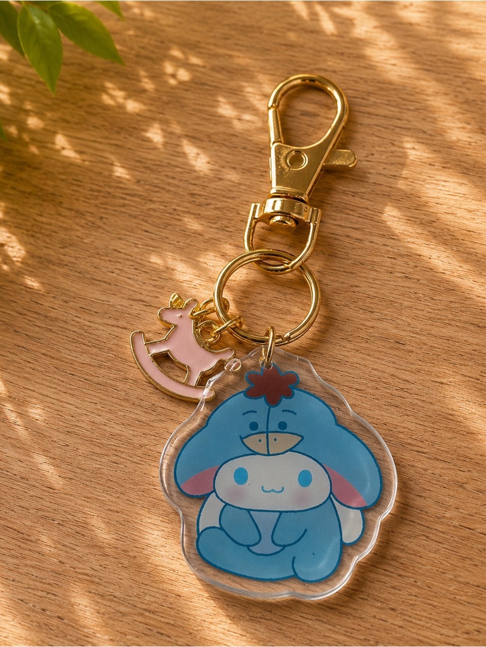 Handmade Hello Kitty Cinnamon Role as Eeyore inspired keychain/bag charm